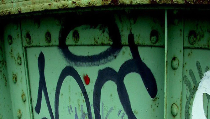 Remove Graffiti From Metal Surfaces:
