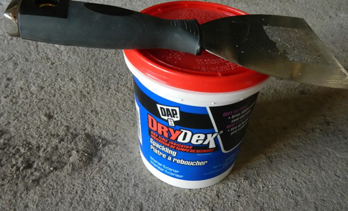 Fill In Grain And Imperfections With Drydex And A Putty Knife