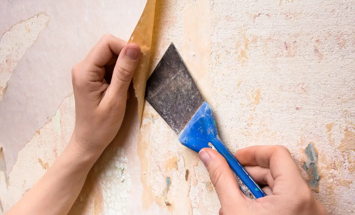 Scraping The Glue Off with A Putty Knife