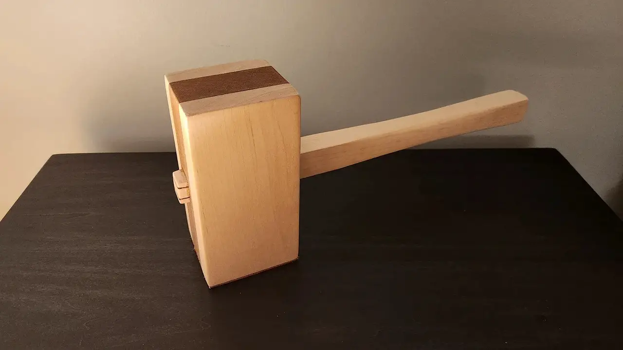 Tap The Screw Out Of The Wood Using A Mallet