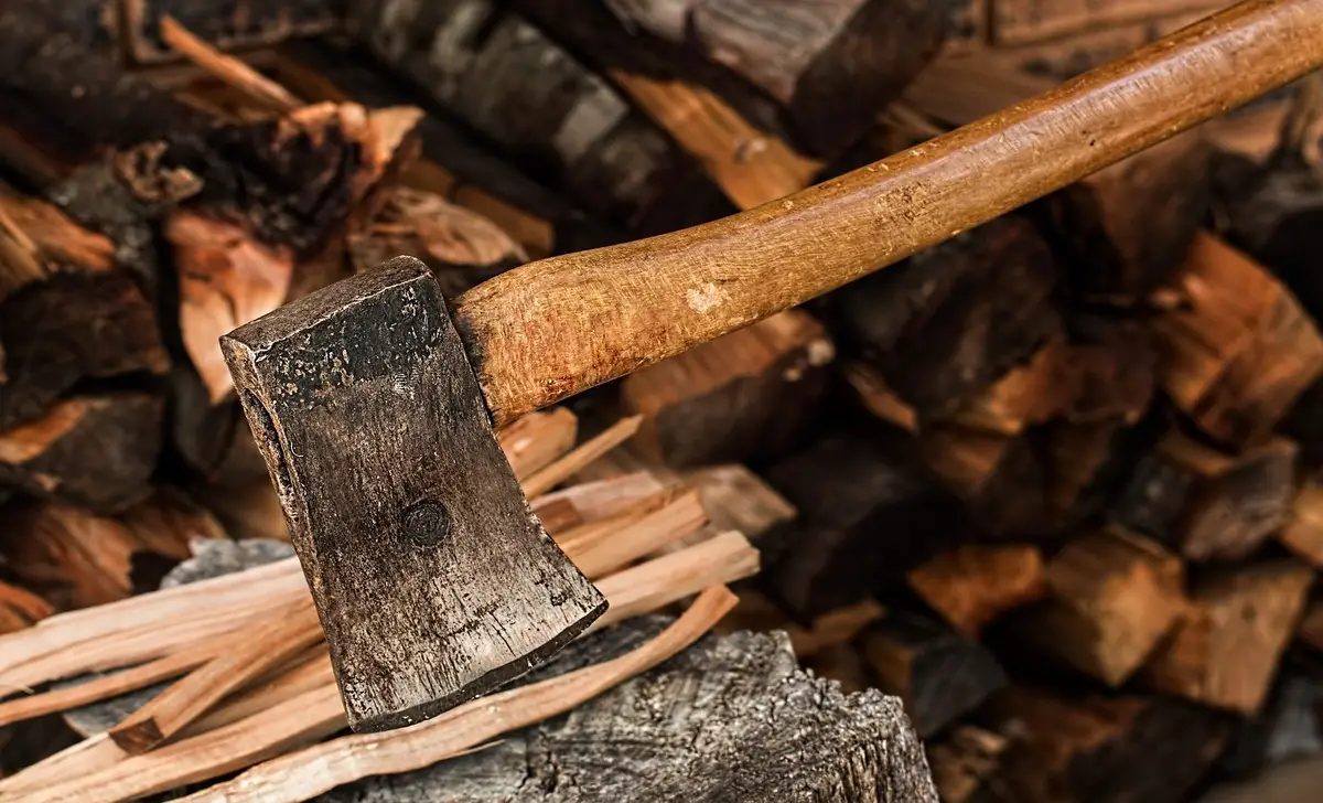 Use A Hatchet Or Axe To Cut The Wood Into Small Pieces